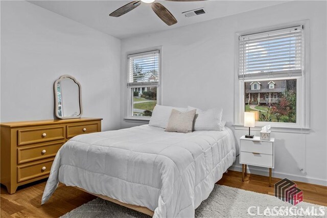 1061 Calls Creek Dr, Watkinsville, GA 30677 - bedroom with wood finished floors and ceiling fan