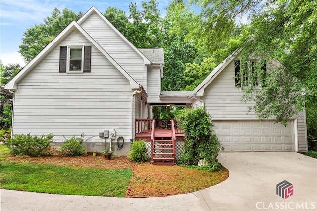 1061 Calls Creek Dr, Watkinsville, GA 30677 - view of front facade featuring a wooden deck, a garage, concrete driveway, and crawl space