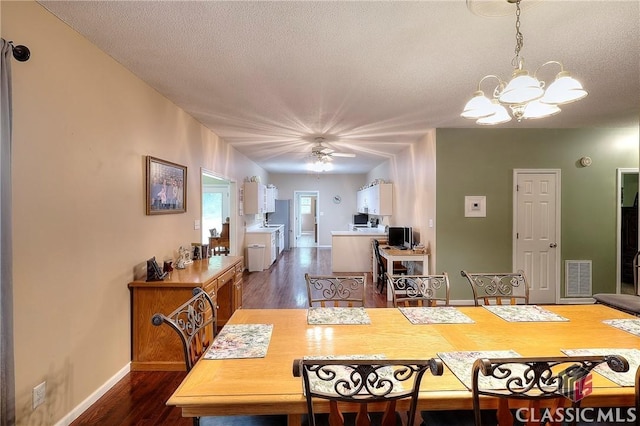 224 Red Oak Dr, Maysville, GA 30558 - dining space featuring a chandelier, dark wood-style flooring, a textured ceiling, baseboards, and ceiling fan