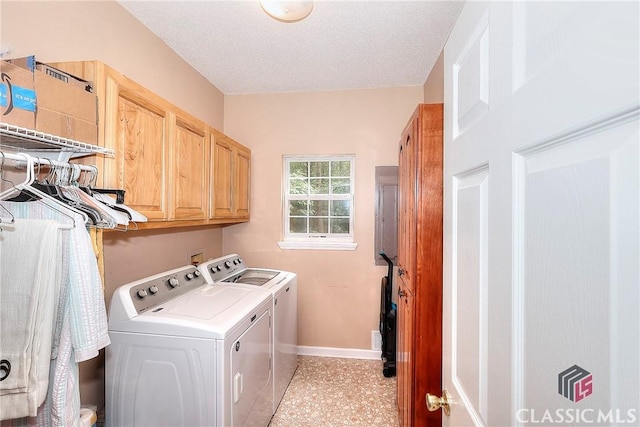 224 Red Oak Dr, Maysville, GA 30558 - laundry room with washing machine and dryer, cabinet space, baseboards, and a textured ceiling