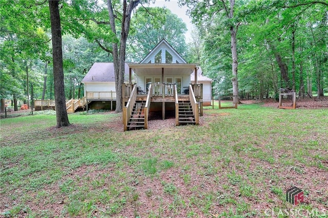224 Red Oak Dr, Maysville, GA 30558 - rear view of house featuring stairs, a yard, and a deck
