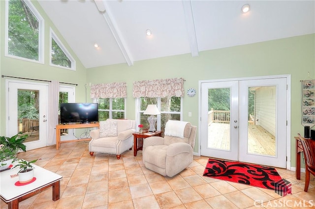 224 Red Oak Dr, Maysville, GA 30558 - living room with french doors, high vaulted ceiling, plenty of natural light, beamed ceiling, and light tile patterned floors