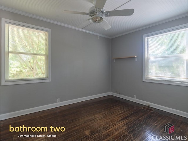 269 Magnolia St, Athens, GA 30606 - unfurnished room featuring healthy amount of natural light, hardwood / wood-style floors, crown molding, and baseboards