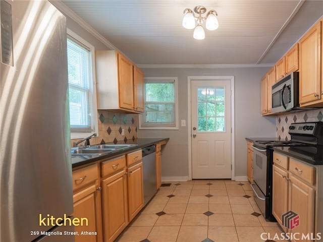 269 Magnolia St, Athens, GA 30606 - kitchen with stainless steel appliances, a sink, dark countertops, tasteful backsplash, and light tile patterned floors
