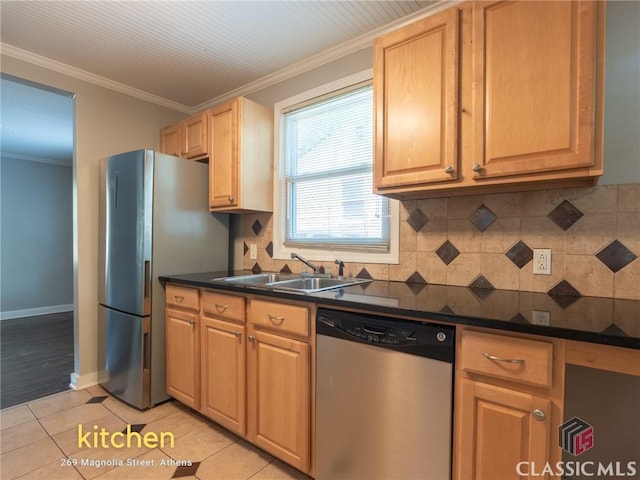269 Magnolia St, Athens, GA 30606 - kitchen with appliances with stainless steel finishes, a sink, dark countertops, backsplash, and crown molding