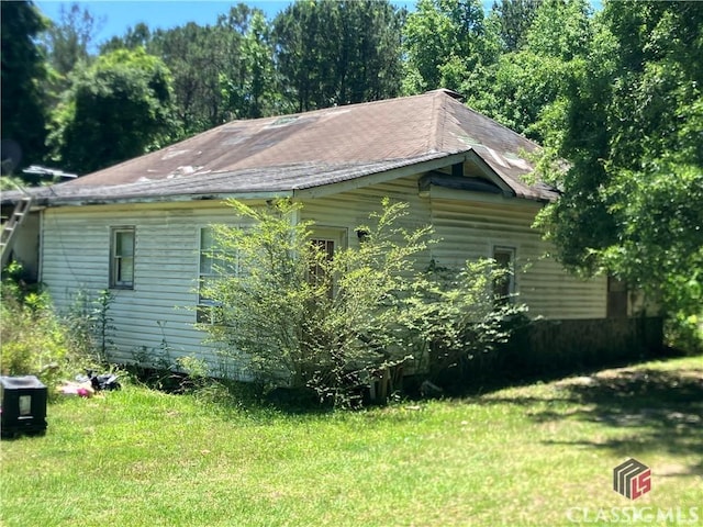 72 N Pomona Rd, Hampton, GA 30228 - view of home's exterior featuring a lawn