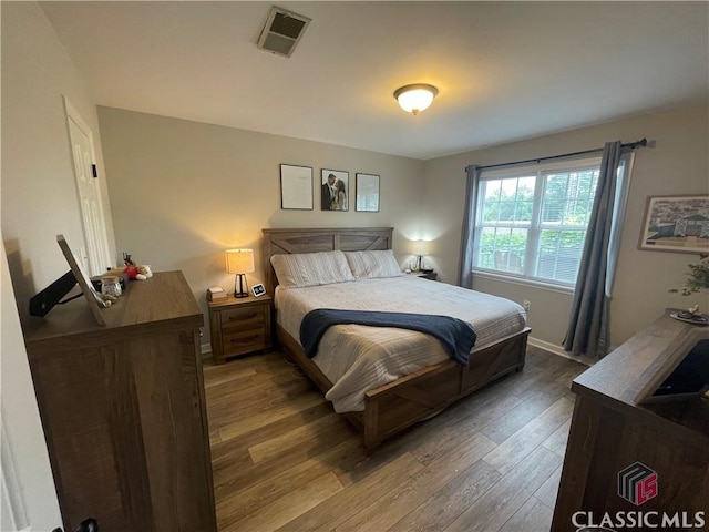2165 Milledge Dr S, Athens, GA 30605 - bedroom with wood finished floors and baseboards