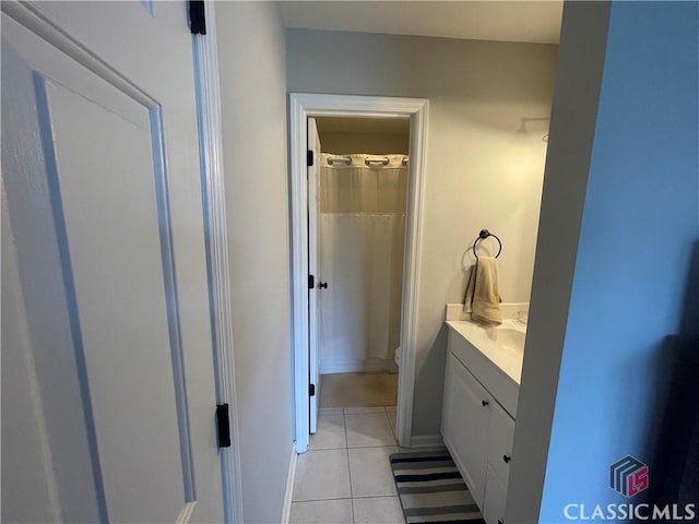2165 Milledge Dr S, Athens, GA 30605 - full bathroom with vanity, toilet, tile patterned flooring, and a shower with curtain