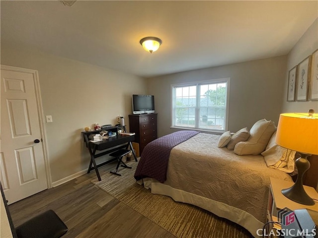 2165 Milledge Dr S, Athens, GA 30605 - bedroom featuring wood finished floors, baseboards, and a desk