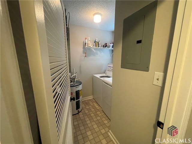 2165 Milledge Dr S, Athens, GA 30605 - laundry area featuring electric panel, washing machine and dryer, a textured ceiling, light tile patterned flooring, and water heater
