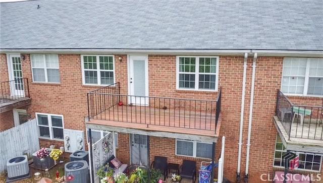 2165 Milledge Dr S, Athens, GA 30605 - exterior space featuring a balcony, central air condition unit, and brick siding