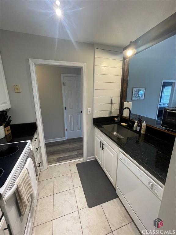 2165 Milledge Dr S, Athens, GA 30605 - bathroom with tile patterned floors and vanity