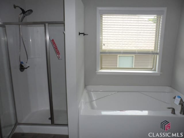 628 Holliman Cir, Pendergrass, GA 30567 - full bath with a shower stall and a garden tub
