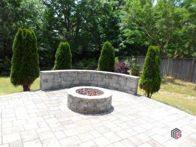 628 Holliman Cir, Pendergrass, GA 30567 - view of patio featuring an outdoor fire pit