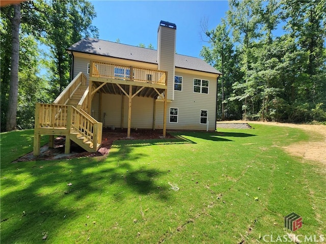 355 Discovery Trl, Athens, GA 30605 - back of property featuring stairs, a wooden deck, a yard, and a chimney