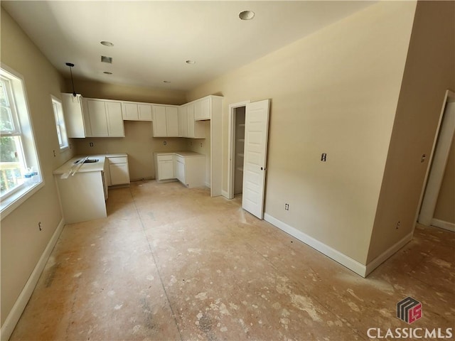 355 Discovery Trl, Athens, GA 30605 - kitchen featuring white cabinetry and pendant lighting