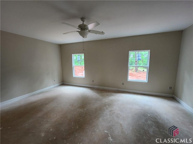 355 Discovery Trl, Athens, GA 30605 - spare room with concrete floors, a ceiling fan, and baseboards