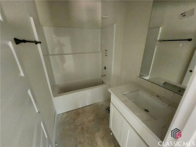 365 Discovery Trl, Athens, GA 30605 - full bathroom with vanity, concrete floors, and washtub / shower combination