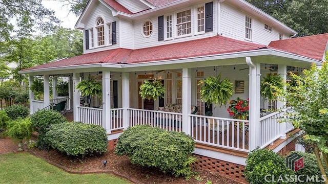 416 Mcdaniel St, Monroe, GA 30655 - view of front of property featuring covered porch and a shingled roof