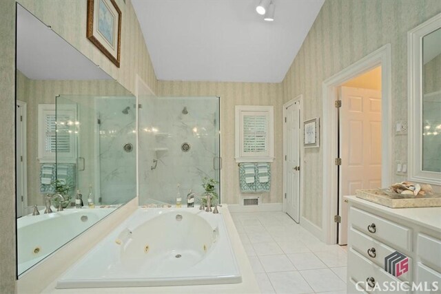 416 Mcdaniel St, Monroe, GA 30655 - bathroom featuring wallpapered walls, a whirlpool tub, tile patterned flooring, a marble finish shower, and vanity