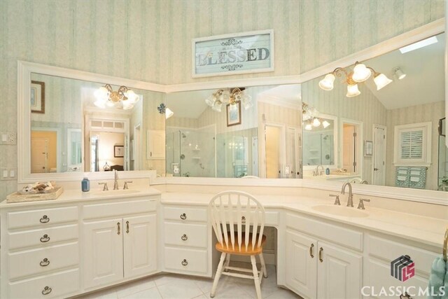 416 Mcdaniel St, Monroe, GA 30655 - full bath with wallpapered walls, a chandelier, vanity, a stall shower, and tile patterned floors