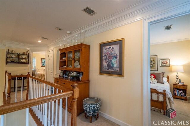 416 Mcdaniel St, Monroe, GA 30655 - hall featuring an upstairs landing, carpet, ornamental molding, a baseboard radiator, and recessed lighting