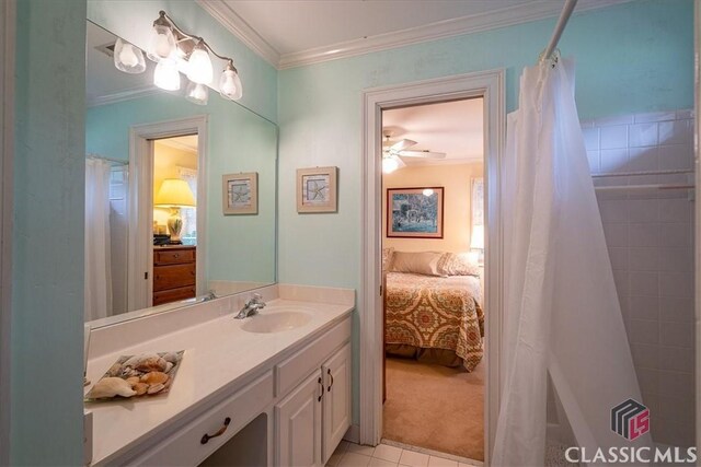 416 Mcdaniel St, Monroe, GA 30655 - bathroom featuring connected bathroom, vanity, ornamental molding, and a shower with shower curtain