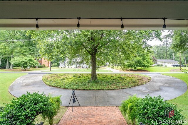 416 Mcdaniel St, Monroe, GA 30655 - view of property's community featuring a lawn