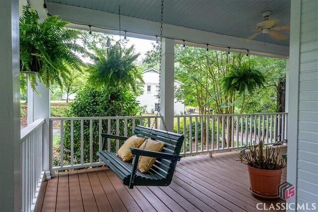 416 Mcdaniel St, Monroe, GA 30655 - wooden porch featuring ceiling fan