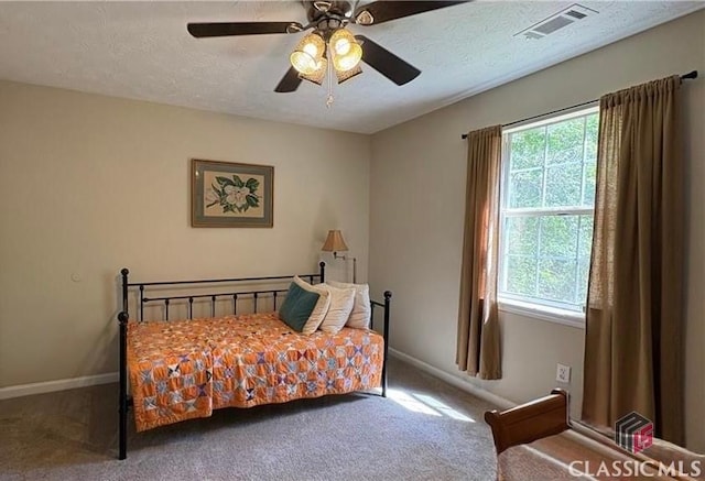 210 Big Oak Cir, Athens, GA 30605 - carpeted bedroom with baseboards, ceiling fan, and a textured ceiling