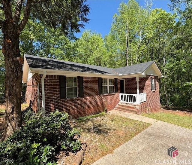 210 Big Oak Cir, Athens, GA 30605 - single story home featuring brick siding, a porch, and roof with shingles