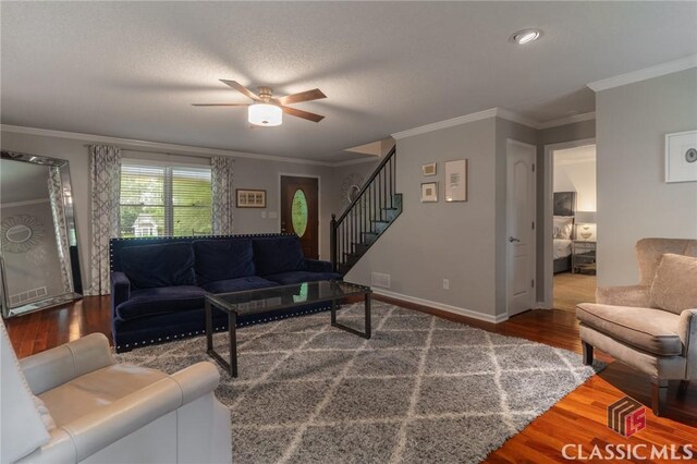 4080 Derby, Cumming, GA 30040 - living area featuring stairs, wood finished floors, ceiling fan, crown molding, and baseboards