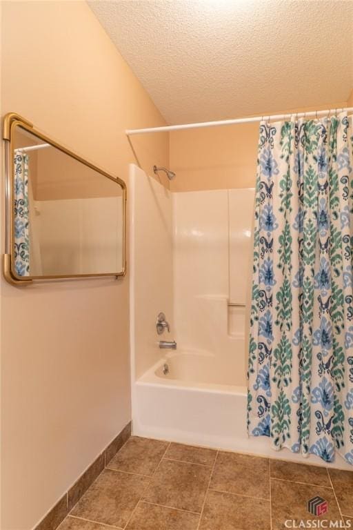4080 Derby, Cumming, GA 30040 - full bath featuring shower / bath combo with shower curtain, a textured ceiling, tile patterned floors, and baseboards