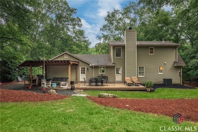 4080 Derby, Cumming, GA 30040 - back of property featuring a chimney, a deck, central air condition unit, a lawn, and a pergola