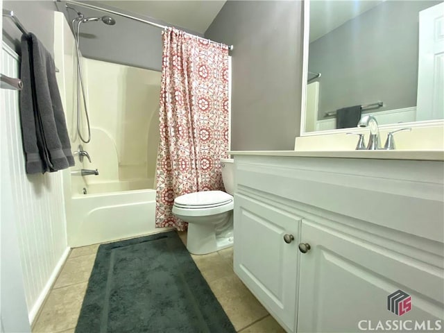 1100 Roberta Dr, Bishop, GA 30621 - bathroom with toilet, shower / bath combo with shower curtain, vanity, and tile patterned floors