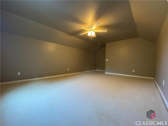 1100 Roberta Dr, Bishop, GA 30621 - additional living space with lofted ceiling, ceiling fan, light colored carpet, and baseboards