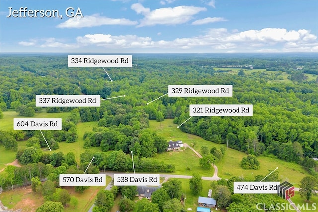 570 Davis Rd, Jefferson, GA 30549 - aerial view of property's location with a heavily wooded area and property parcel outlined