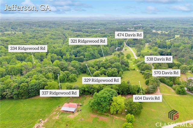 570 Davis Rd, Jefferson, GA 30549 - aerial view of property's location featuring a heavily wooded area and property parcel outlined
