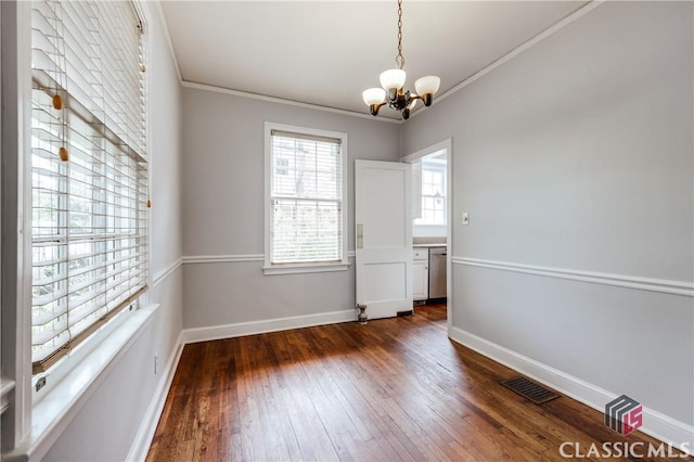 170 Stanton, Athens, GA 30606 - unfurnished dining area with a chandelier, dark wood finished floors, ornamental molding, and baseboards