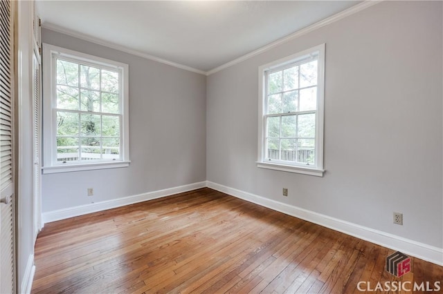 170 Stanton, Athens, GA 30606 - spare room with wood-type flooring, baseboards, and crown molding