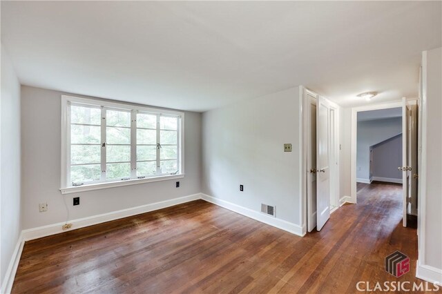 170 Stanton, Athens, GA 30606 - unfurnished room with dark wood finished floors and baseboards