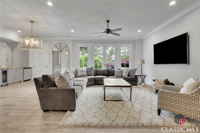 710 Cox Rd, Milton, GA 30075 - living area with crown molding, beverage cooler, recessed lighting, ceiling fan, and light wood-type flooring