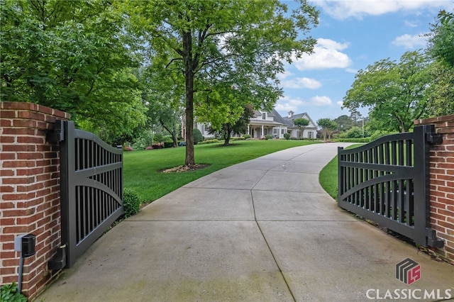 710 Cox Rd, Milton, GA 30075 - gate featuring a yard