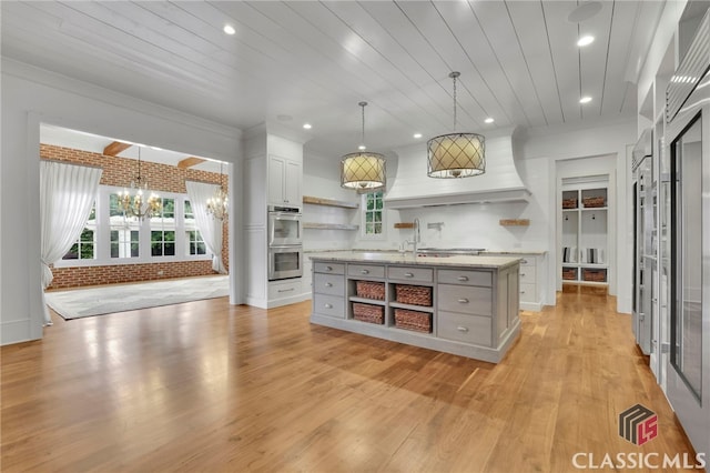 710 Cox Rd, Milton, GA 30075 - kitchen featuring open shelves, stainless steel double oven, a chandelier, white cabinets, and recessed lighting
