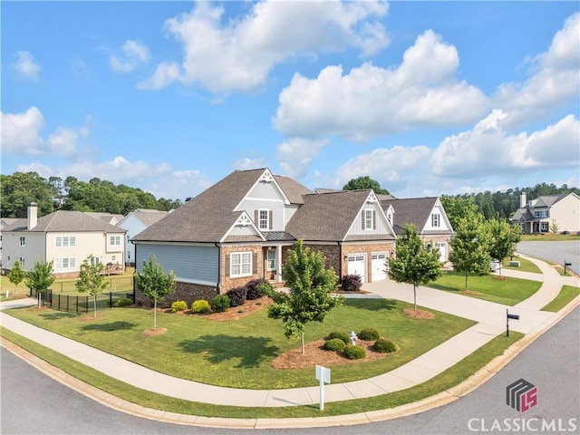 1810 Willow Creek Dr, Watkinsville, GA 30677 - craftsman-style house featuring a residential view, driveway, stone siding, and a garage