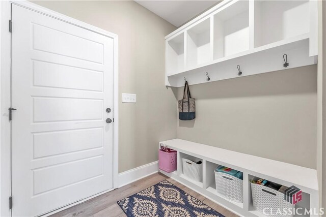 1810 Willow Creek Dr, Watkinsville, GA 30677 - mudroom featuring light wood finished floors and baseboards