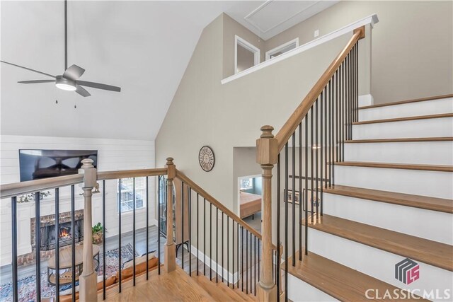 1810 Willow Creek Dr, Watkinsville, GA 30677 - stairs with a ceiling fan, high vaulted ceiling, and wood finished floors