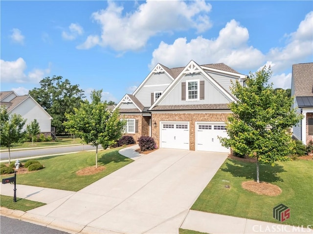 1810 Willow Creek Dr, Watkinsville, GA 30677 - craftsman house with board and batten siding, concrete driveway, a front yard, and a garage