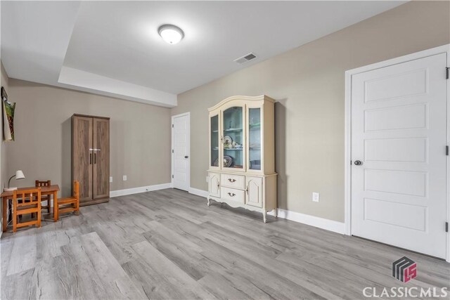 1810 Willow Creek Dr, Watkinsville, GA 30677 - unfurnished living room featuring light wood-type flooring and baseboards