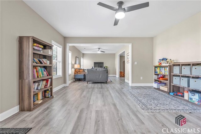 1810 Willow Creek Dr, Watkinsville, GA 30677 - living room featuring ceiling fan, wood finished floors, and baseboards